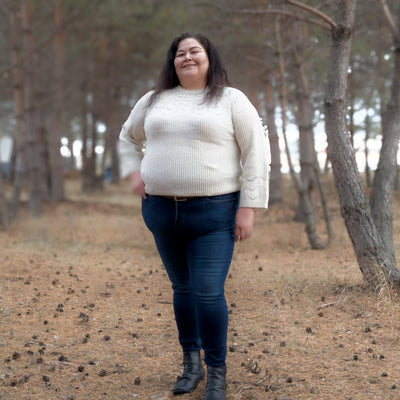 Plus sized woman wearing the soft and comfortable Ella sweater 