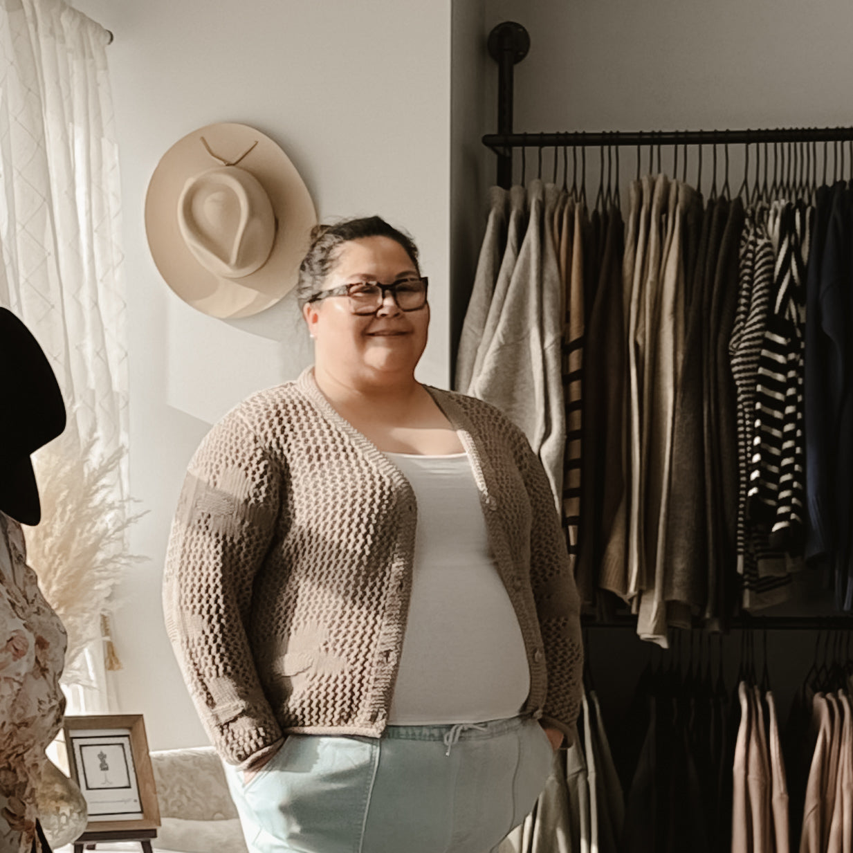 Curvy woman wearing a cute and comfortable open knit crochet floral
Cardigan 