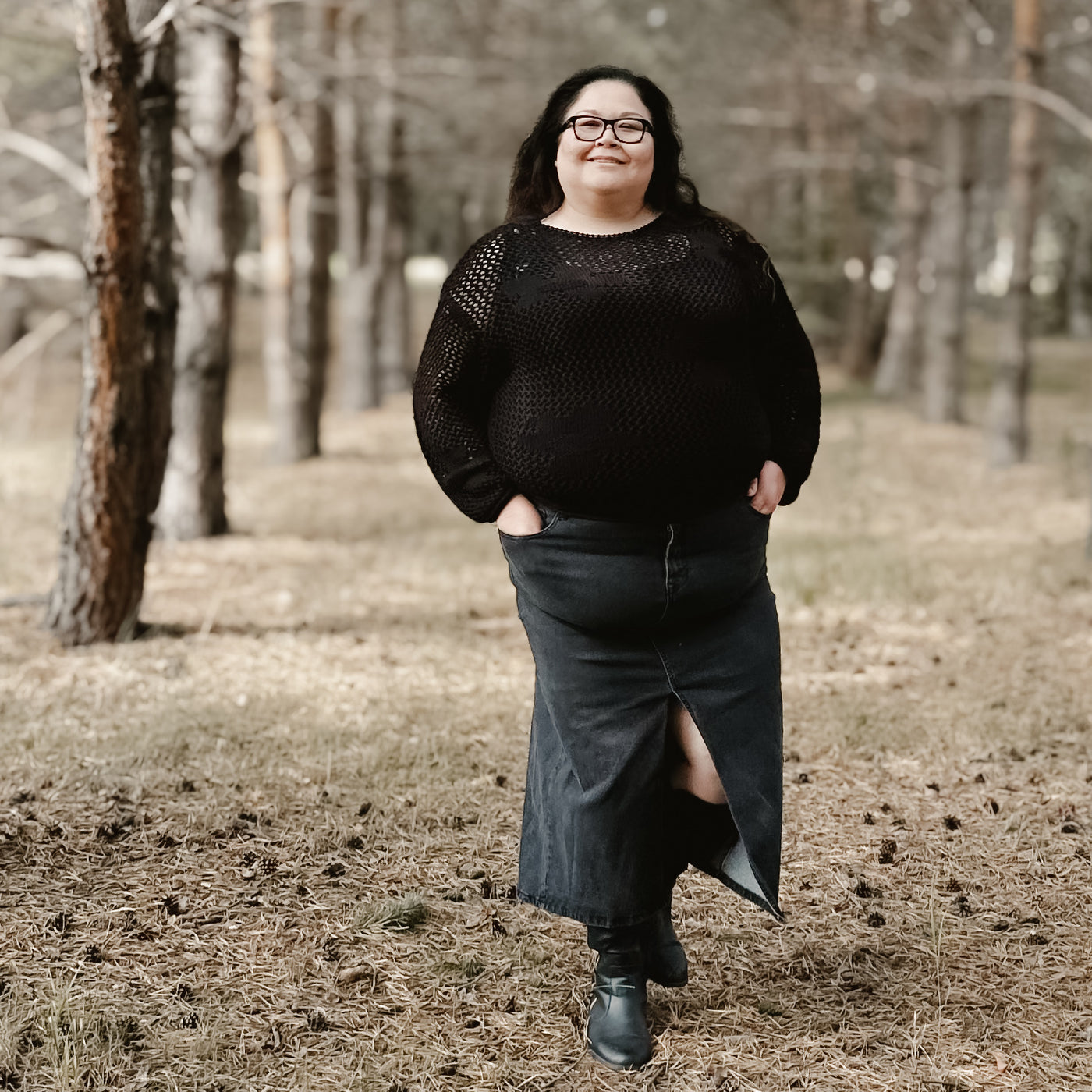 Curvy woman wearing the Dex floral crochet knit sweater looking trendy and comfortable 