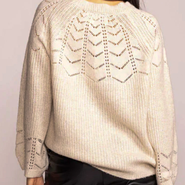 Comfortable knit sweater with eyelet detail 