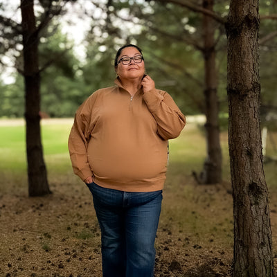 Curvy woman wearing brunette the label not your boyfriend half zip in fawn 