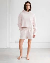 Brunette the Labels Cropped Core Hoodie in the color Bellini with matching shorts made with a soft and comfortable French Terry for a trendy leisure look 