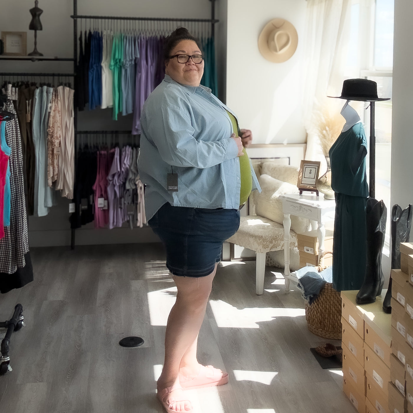 Curvy woman wearing the chambray long sleeved button up by brunette the label 