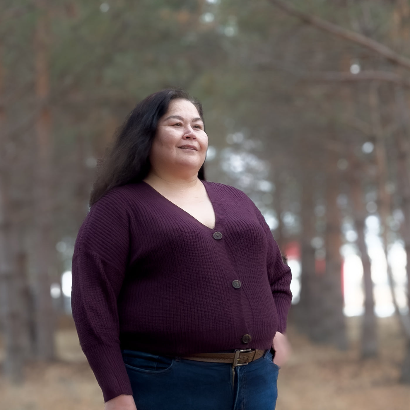 Curvy woman wearing a cute and comfortable V-neck cardigan 