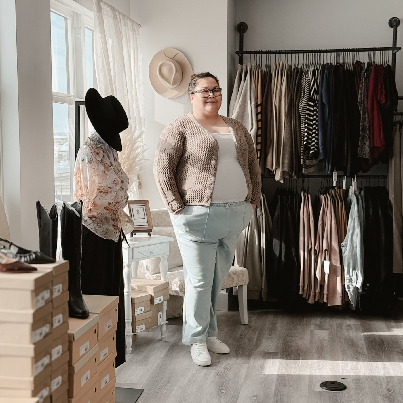 Curvy woman wearing a trendy & comfortable floral knit cardigan and pants 