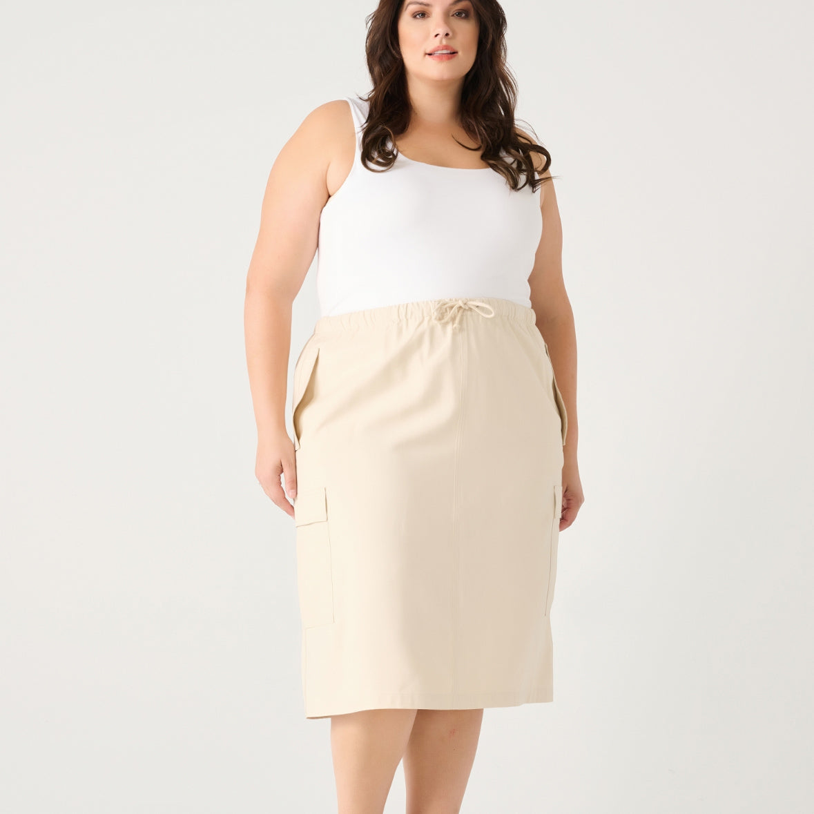 Plus size woman wearing the Dex Cream coloured Cargo Skirt 