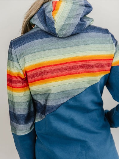 blue hoodie woth sunset colored trim 