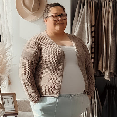 Plus size woman wearing the dex floral crochet cardigan in taupe 